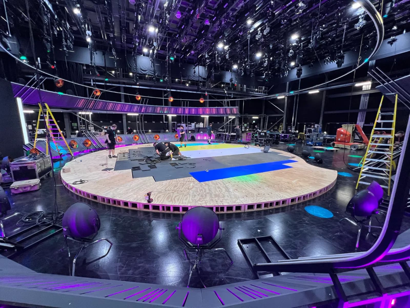 Circular studio stage being decked and finished